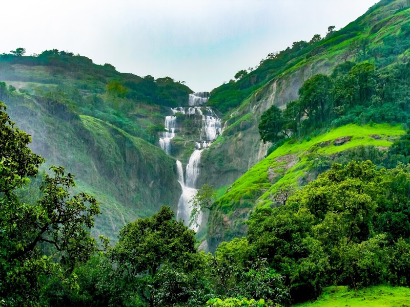 Scenic hill view from Necklace Hill View Resort in Bhandardara surrounded by lush green mountains and natural landscapes, offering a peaceful getaway for nature lovers.