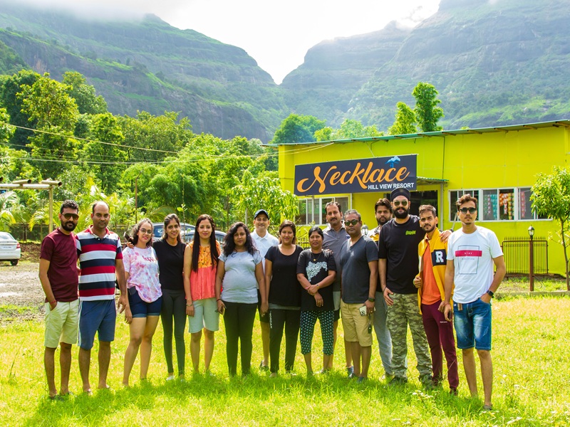 Family enjoying a picnic in the hills of Bhandardara