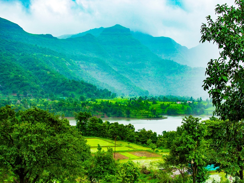 Scenic nature resort surrounded by hills in Bhandardara