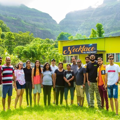 Family enjoying a picnic in the hills of Bhandardara