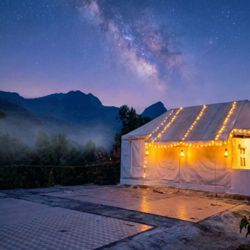A stunning night-time camping experience with mountain views at the Best Resort in Bhandardara.